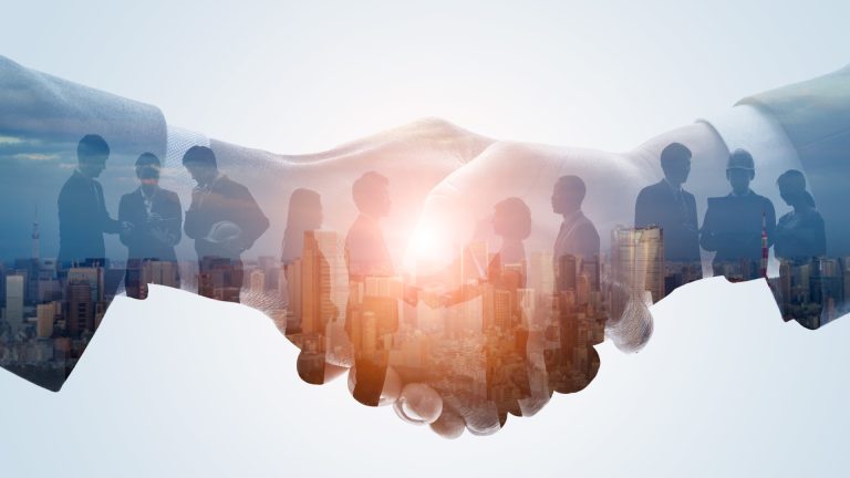 An abstract picture of handshake symbolizing networking.
